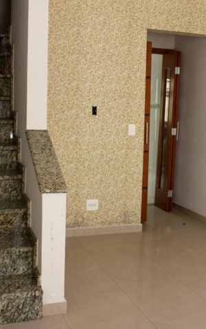 Casa de condomínio à venda com 69m², 2 quartos e 1 vagasala