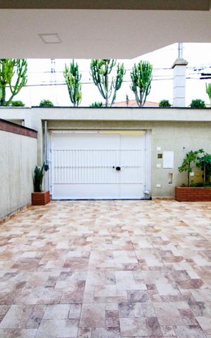 Casa à venda com 600m², 4 quartos e 5 vagas Casa à venda com 600m², 4 quartos e 5 vagasGaragem