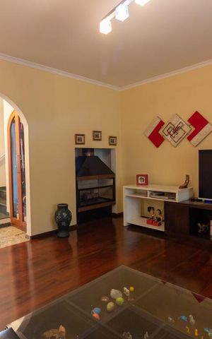 Casa de condomínio para alugar com 380m², 4 quartos e 2 vagasSala