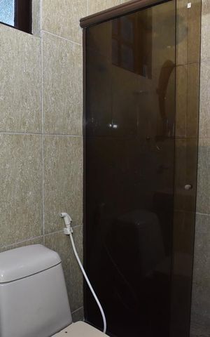 Casa à venda com 283m², 5 quartos e 4 vagasBanheiro Suíte 1