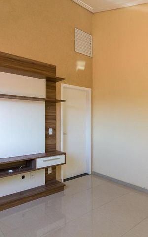 Casa à venda com 159m², 3 quartos e 2 vagasSala de TV
