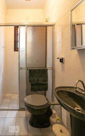 Casa à venda com 380m², 4 quartos e 5 vagasBanheiro de Serviço