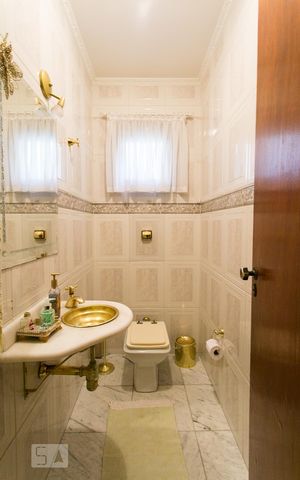 Casa à venda com 350m², 3 quartos e 4 vagasLavabo 1