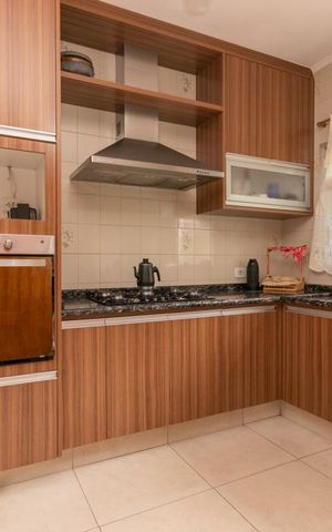 Casa à venda com 220m², 4 quartos e 4 vagas Casa à venda com 220m², 4 quartos e 4 vagasCozinha