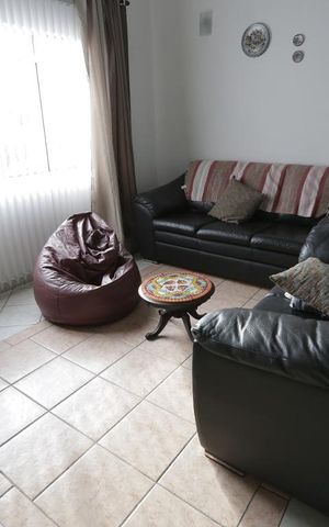 Casa à venda com 412m², 6 quartos e 4 vagasSala