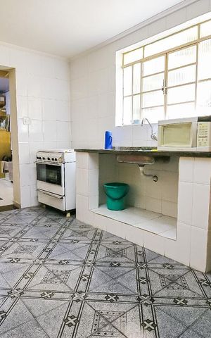 Casa à venda com 90m², 3 quartos e 2 vagas Casa à venda com 90m², 3 quartos e 2 vagasCozinha