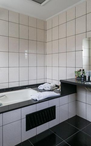 Casa à venda com 260m², 4 quartos e 3 vagasBanheiro da suíte