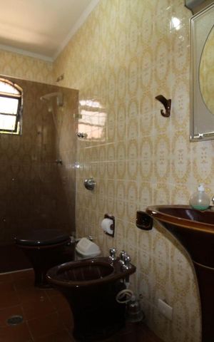 Casa à venda com 352m², 4 quartos e 5 vagas1 suite