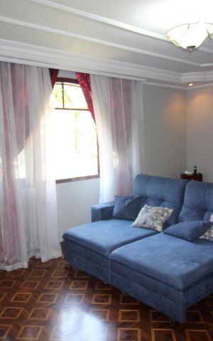 Casa à venda com 352m², 4 quartos e 5 vagasSala