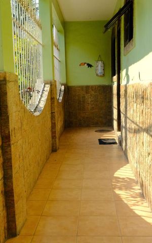 Casa à venda com 382m², 5 quartos e 1 vagaCorredor - frente da casa