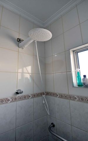 Casa à venda com 250m², 4 quartos e 2 vagasChuveiro Elétrico