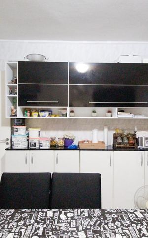 Casa à venda com 165m², 3 quartos e 3 vagas Casa à venda com 165m², 3 quartos e 3 vagasCozinha