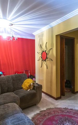 Casa à venda com 74m², 3 quartos e 2 vagas Casa à venda com 74m², 3 quartos e 2 vagasSala de estar