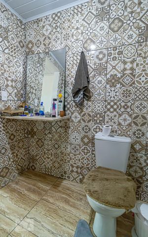 Casa à venda com 135m², 4 quartos e 1 vaga Casa à venda com 135m², 4 quartos e 1 vagaBanheiro da Suíte