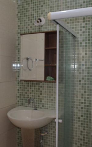 Casa de condomínio à venda com 68m², 2 quartos e 2 vagasBanheiro Social