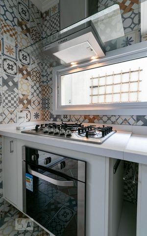 Casa para alugar com 360m², 3 quartos e 6 vagasCozinha - Fogão