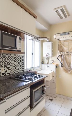 Apartamento para alugar com 58m², 2 quartos e 1 vaga Apartamento para alugar com 58m², 2 quartos e 1 vagaCozinha e Área de Serviço
