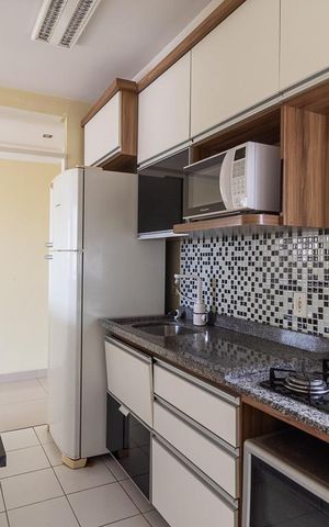 Apartamento para alugar com 58m², 2 quartos e 1 vaga Apartamento para alugar com 58m², 2 quartos e 1 vagaCozinha e Área de Serviço