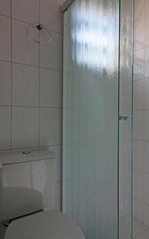 Casa de condomínio para alugar com 110m², 3 quartos e 2 vagasBanheiro da Suíte