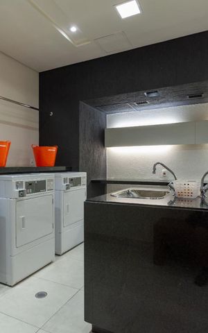 Studio para alugar com 49m², 1 quarto e 1 vaga Studio para alugar com 49m², 1 quarto e 1 vagaÁrea comum - lavanderia