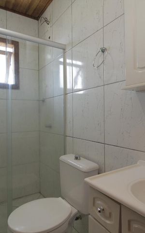 Casa à venda com 82m², 2 quartos e 3 vagasBanheiro da Suíte