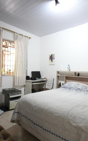 Casa à venda com 208m², 4 quartos e 2 vagasQuarto 1