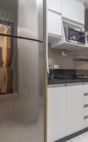 Casa à venda com 125m², 2 quartos e 2 vagas Casa à venda com 125m², 2 quartos e 2 vagasCozinha