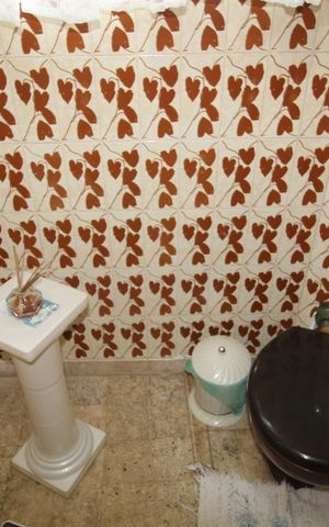 Casa à venda com 310m², 5 quartos e 2 vagasBanheiro 1 lavabo