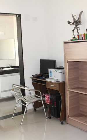 Casa de condomínio à venda com 130m², 3 quartos e 1 vagaSuíte 1 