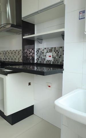 Apartamento à venda com 60m², 2 quartos e 1 vagaCozinha e Área de Serviço