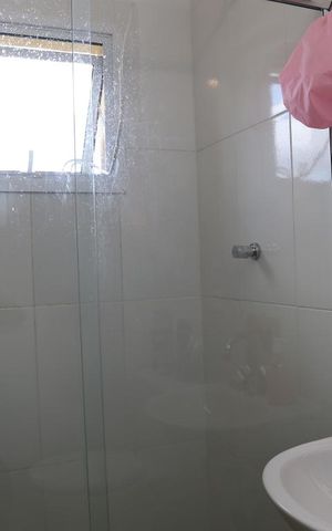 Casa de condomínio à venda com 128m², 3 quartos e 2 vagasBanheiro da Suíte