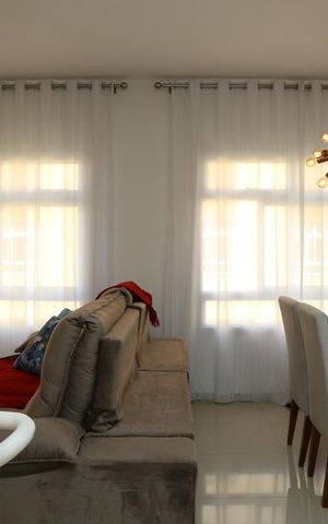 Casa de condomínio à venda com 128m², 3 quartos e 2 vagasSala