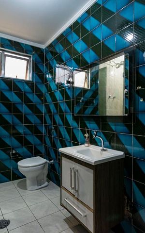 Casa à venda com 200m², 3 quartos e 3 vagasBanheiro 2