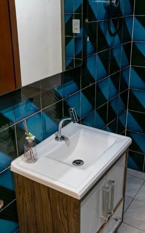Casa à venda com 200m², 3 quartos e 3 vagasBanheiro 2