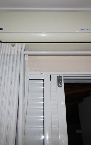 Casa à venda com 200m², 2 quartos e 2 vagasAr condicionado Suite 2