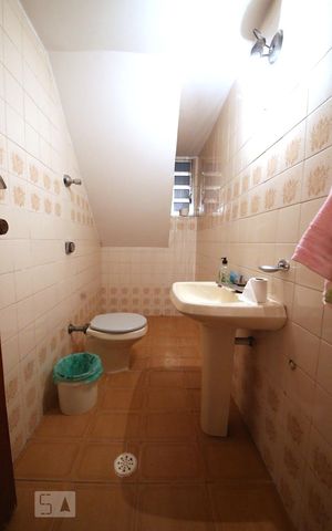 Casa à venda com 206m², 4 quartos e 6 vagasBanheiro de Serviço 2