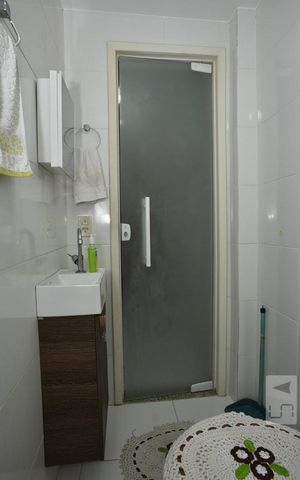 Casa de condomínio para alugar com 180m², 2 quartos e 2 vagasBanheiro da Suíte 1