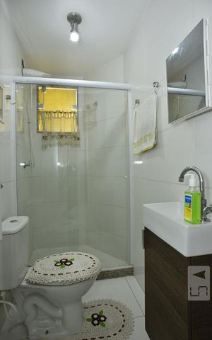 Casa de condomínio para alugar com 180m², 2 quartos e 2 vagasBanheiro da Suíte 1
