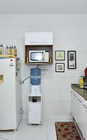 Casa de condomínio para alugar com 180m², 2 quartos e 2 vagasCozinha