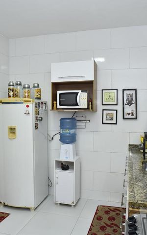 Casa de condomínio para alugar com 180m², 2 quartos e 2 vagasCozinha