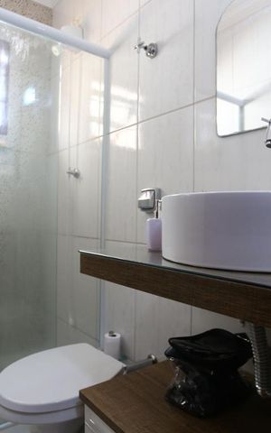 Casa à venda com 128m², 3 quartos e 4 vagasBanheiro da Suíte 1