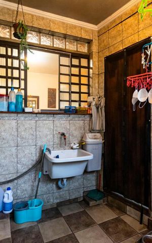 Casa à venda com 100m², 3 quartos e 2 vagas1o. Andar - Área de serviço