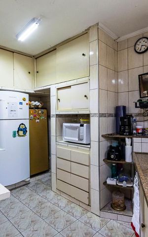 Casa à venda com 100m², 3 quartos e 2 vagas1o. Andar - Cozinha