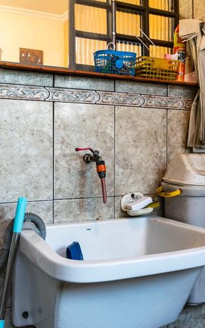 Casa à venda com 100m², 3 quartos e 2 vagas1o. Andar - Área de serviço