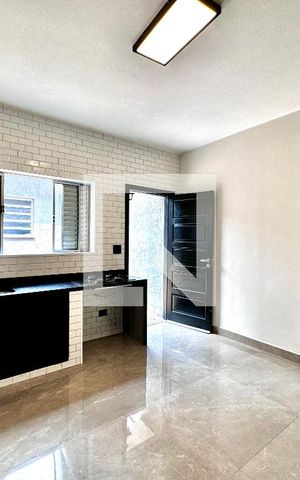 Casa à venda com 140m², 2 quartos e 2 vagas Casa à venda com 140m², 2 quartos e 2 vagasCozinha
