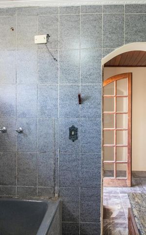 Casa à venda com 151m², 3 quartos e 3 vagasBanheiro do Quarto 1 - Suíte