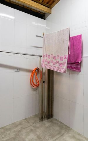 Casa à venda com 95m², 2 quartos e 2 vagas1o. Andar - Área de serviço