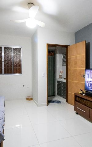 Casa à venda com 95m², 2 quartos e 2 vagas1o. Andar - Sala
