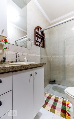 Casa à venda com 106m², 4 quartos e 2 vagas Casa à venda com 106m², 4 quartos e 2 vagasBanheiro da Suíte