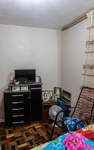 Casa à venda com 101m², 3 quartos e 1 vagaQuarto Casa dos Fundos